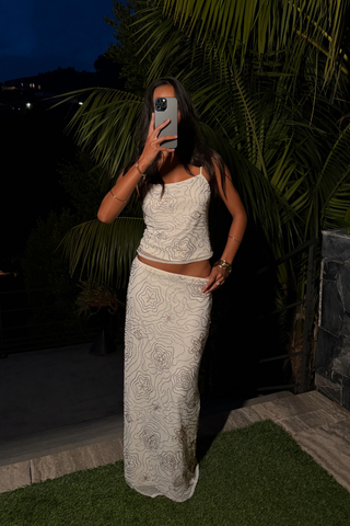 Camiseta sin mangas con cuentas blancas de Luci