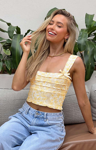 Top de lazo de encaje amarillo Vida