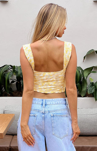 Top de lazo de encaje amarillo Vida