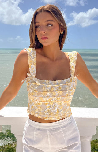 Top de lazo de encaje amarillo Vida